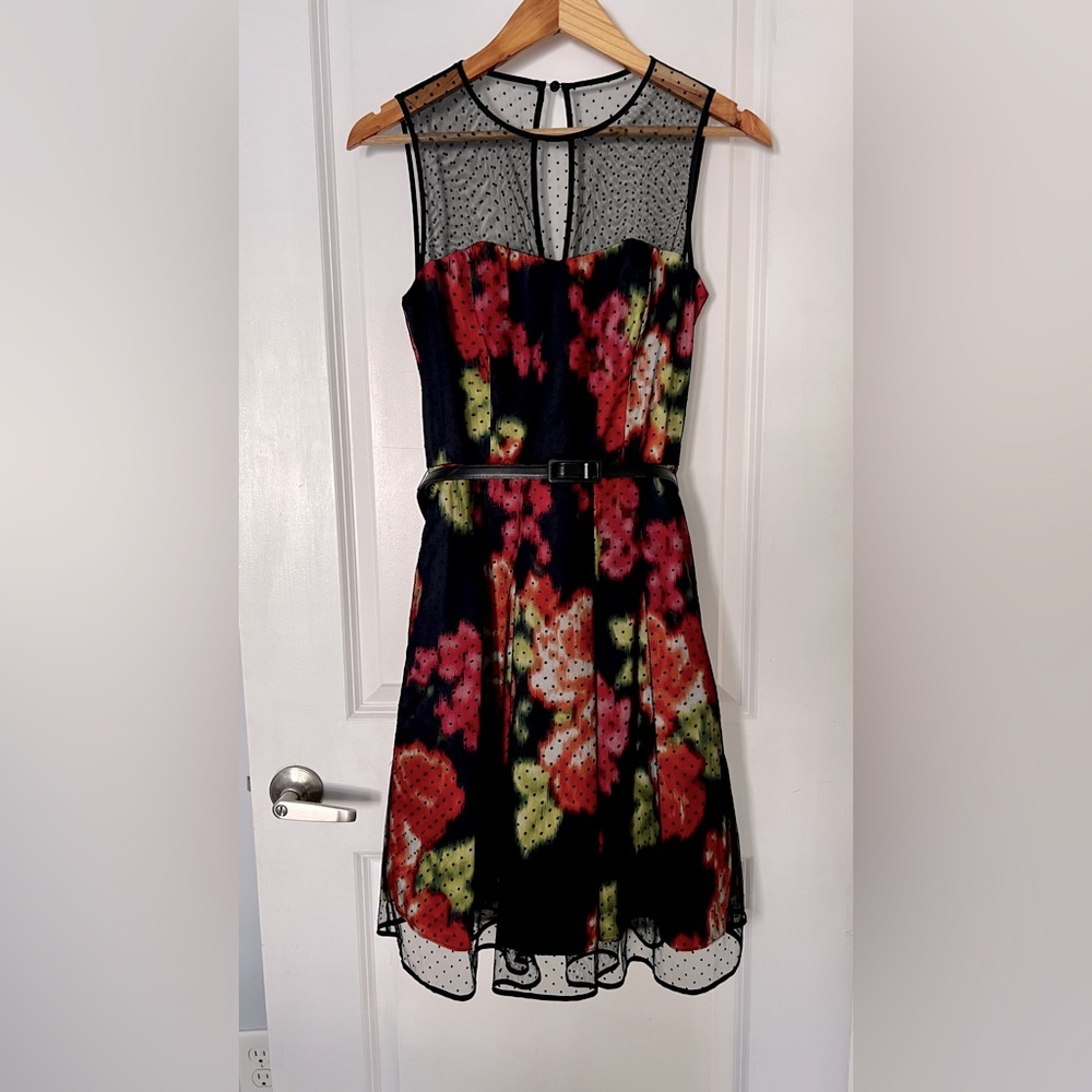 Never used beautiful classic dress size 8, with belt